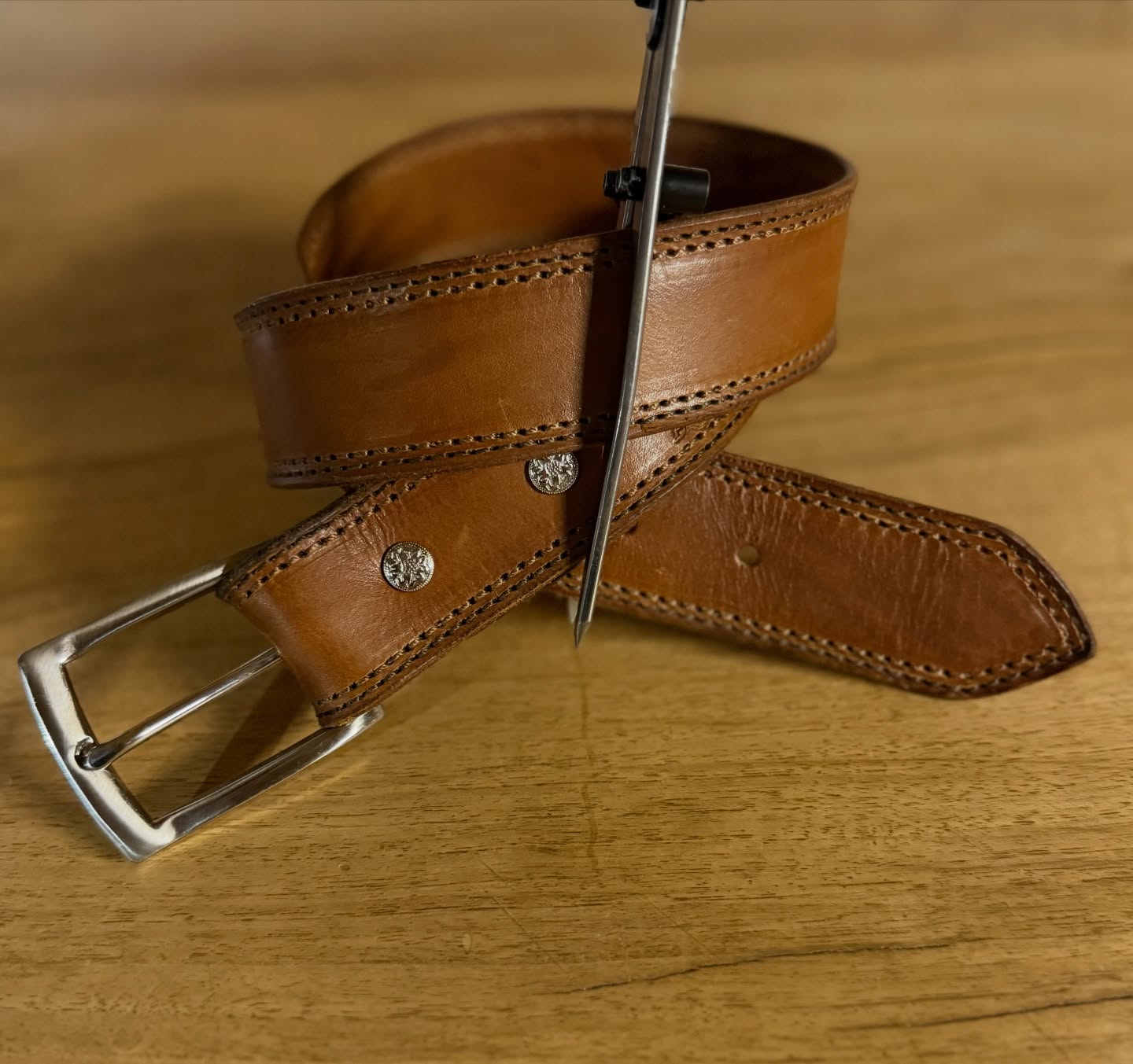 Custom handmade leather belt with silver buckle